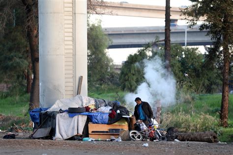San Jose homeless encampment near freeway reportedly on fire
